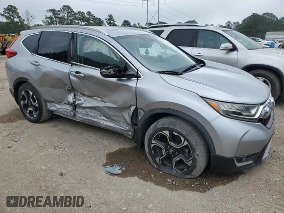 2018 Honda CR-V Touring with VIN 7FARW1H91JE039573, listed as a Copart auction lot 54144205 with 87,704 mi miles and Salvage Title. Bid and sale history available at DreamBid. Image 4.
