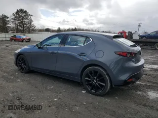 2020 Mazda Mazda3 Hatchback Premium Package with VIN JM1BPBNM0L1175925, listed as a Copart auction lot 52378605 with 47,301 mi miles and Salvage Title. Bid and sale history available at carsss.com. Image 2.