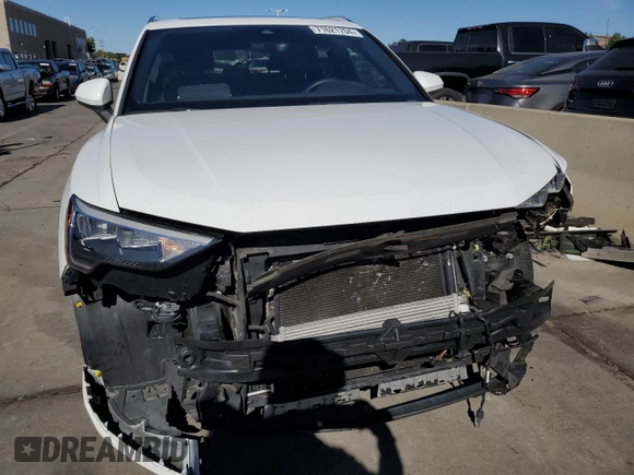 2021 Audi Q3 Premium z VIN WA1AUCF38M1067676, wystawiony jako Copart lot #71621704 z przebiegiem 77 395 mil mil oraz Szkoda całkowita • Salvage title. Historia ofert i sprzedaży dostępna na DreamBid. Obrazek 5.