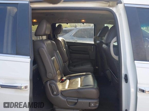 2012 Honda Odyssey EX-L with VIN 5FNRL5H62CB010054, listed as a IAAI auction lot 42040117 with 189,566 mi miles and . Bid and sale history available at carsss.com. Image 8.