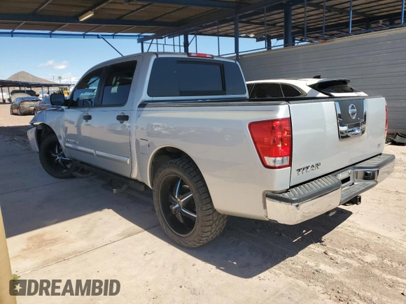 2012 Nissan Titan SV with VIN 1N6AA0EK5CN327266, listed as a Copart auction lot 49706135 with 188,366 mi miles and Salvage Title. Bid and sale history available at DreamBid. Image 2.