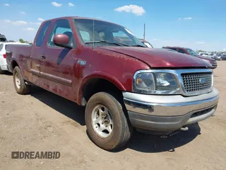 1997 Ford F-150 z VIN 2FTDX18WXVCA51615, wystawiony jako IAAI lot #42425367 z przebiegiem 160 402 mil mil oraz . Historia ofert i sprzedaży dostępna na DreamBid. Obrazek 1.