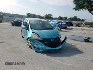2013 Honda Fit Sport z VIN JHMGE8H50DC006995, wystawiony jako Copart lot #58854875 z przebiegiem 78 207 mil mil oraz Szkoda całkowita • Salvage title. Historia ofert i sprzedaży dostępna na DreamBid. Obrazek 14.