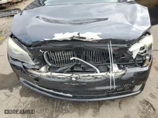 2012 BMW 7 Series 750i xDrive with VIN WBAKC6C52CC396443, listed as a Copart auction lot 44333945 with 134,075 mi miles and Salvage Title. Bid and sale history available at carsss.com. Image 11.