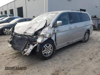 2005 Honda Odyssey EX-L z VIN 5FNRL38735B120076, wystawiony jako Copart lot #67189723 z przebiegiem Nie podano mil oraz Szkoda całkowita • Salvage title. Historia ofert i sprzedaży dostępna na DreamBid. Obrazek 1.
