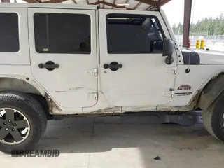 2012 Jeep Wrangler Unlimited Sahara with VIN 1C4BJWEG7CL275883, listed as a IAAI auction lot 42510764 with 149,531 mi miles and . Bid and sale history available at DreamBid. Image 6.