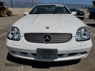 2001 Mercedes-Benz SLK-Class with VIN WDBKK65F81F210099, listed as a Copart auction lot 52606105 with 129,849 mi miles and Salvage Title. Bid and sale history available at carsss.com. Image 5.