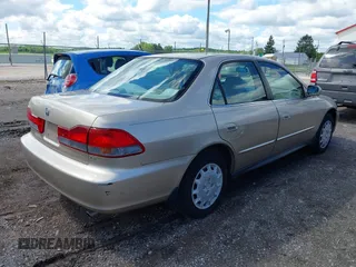 2001 Honda Accord LX with VIN 1HGCG66501A005789, listed as a IAAI auction lot 42217613 with 135,801 mi miles and . Bid and sale history available at DreamBid. Image 4.
