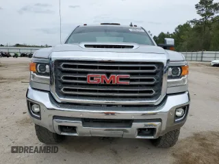 2019 GMC Sierra 2500HD SLT z VIN 1GT12REY3KF236787, wystawiony jako Copart lot #50082485 z przebiegiem Nie podano mil oraz Szkoda całkowita • Salvage title. Historia ofert i sprzedaży dostępna na DreamBid. Obrazek 5.
