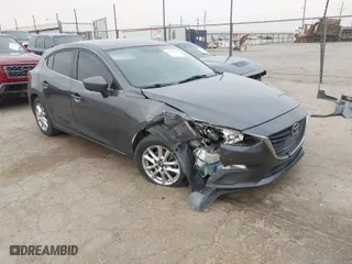2014 Mazda Mazda3 i Touring with VIN JM1BM1L71E1111721, listed as a IAAI auction lot 41695478 with 132,084 mi miles. Bid and sale history available at carsss.com. Image 1.