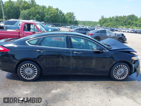 2016 Ford Fusion Titanium z VIN 3FA6P0K97GR174228, wystawiony jako IAAI lot #42636326 z przebiegiem 110 288 mil mil oraz . Historia ofert i sprzedaży dostępna na DreamBid. Obrazek 13.