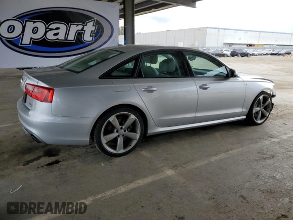 2014 Audi A6 Prestige z VIN WAUHGAFC1EN143102, wystawiony jako Copart lot #53692145 z przebiegiem 101 503 mil mil oraz Szkoda całkowita • Salvage title. Historia ofert i sprzedaży dostępna na DreamBid. Obrazek 3.