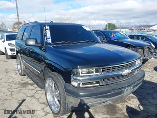 2004 Chevrolet Tahoe LS with VIN 1GNEC13T24R135899, listed as a IAAI auction lot 41539830 with 141,848 mi miles. Bid and sale history available at carsss.com. Image 1.
