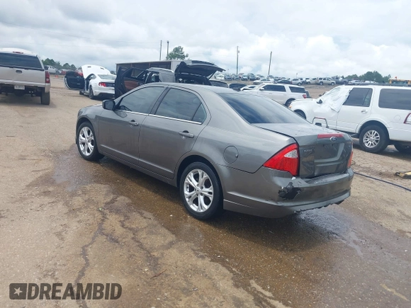 2012 Ford Fusion SE with VIN 3FAHP0HA7CR417511, listed as a IAAI auction lot 42436962 with 266,721 mi miles and . Bid and sale history available at DreamBid. Image 3.