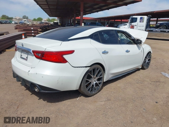 2016 Nissan Maxima SV with VIN 1N4AA6AP8GC379439, listed as a IAAI auction lot 42183728 with 107,857 mi miles and . Bid and sale history available at DreamBid. Image 4.