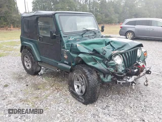 2000 Jeep Wrangler Sahara with VIN 1J4FA59SXYP701098, listed as a IAAI auction lot 41592872 with 1 mi miles. Bid and sale history available at carsss.com. Image 1.