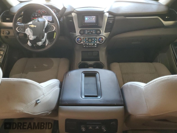 2015 Chevrolet Tahoe LS with VIN 1GNSCAKC5FR501801, listed as a Copart auction lot 50850645 with 112,896 mi miles and Salvage title. Bid and sale history available at DreamBid. Image 8.