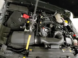 2023 Jeep Wrangler Sport S with VIN 1C4HJXAG9PW677785, listed as a Copart auction lot 70341275 with 32,130 mi miles and Salvage title. Bid and sale history available at DreamBid. Image 14.