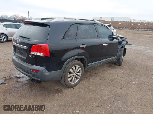 2011 Kia Sorento EX with VIN 5XYKU4A13BG057477, listed as a IAAI auction lot 41512528 with 127,923 mi miles. Bid and sale history available at carsss.com. Image 4.