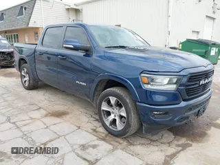 2021 Ram 1500 Laramie with VIN 1C6SRFJT1MN655178, listed as a IAAI auction lot 42355726 with 46,575 mi miles and . Bid and sale history available at DreamBid. Image 1.