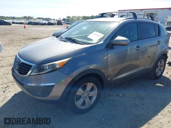 2013 Kia Sportage LX with VIN KNDPB3A21D7486860, listed as a IAAI auction lot 42049450 with 177,059 mi miles and . Bid and sale history available at DreamBid. Image 2.