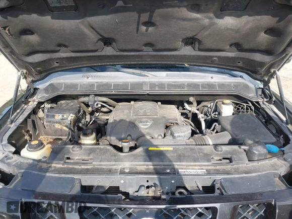 2011 Nissan Titan SL z VIN 1N6AA0EC4BN317674, wystawiony jako IAAI lot #42523569 z przebiegiem 208 045 mil mil oraz . Historia ofert i sprzedaży dostępna na DreamBid. Obrazek 10.