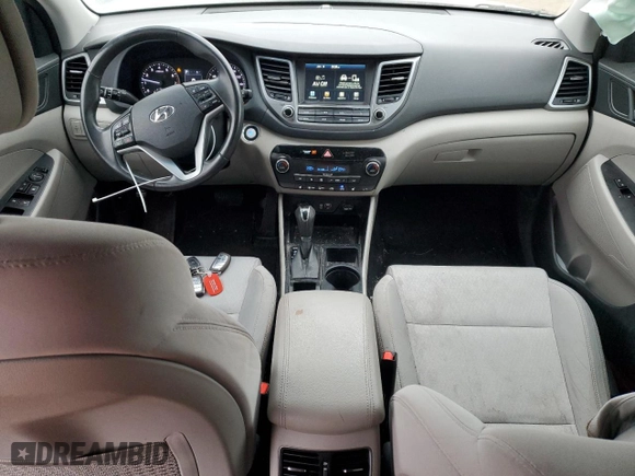 2018 Hyundai Tucson Value with VIN KM8J33A28JU748241, listed as a Copart auction lot 87492464 with 56,457 mi miles and Salvage Title. Bid and sale history available at carsss.com. Image 8.