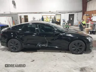 2022 Tesla Model S with VIN 5YJSA1E58NF478403, listed as a IAAI auction lot 41533099 with 42,779 mi miles and . Bid and sale history available at DreamBid. Image 13.
