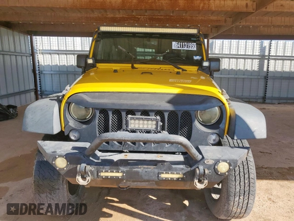 2015 Jeep Wrangler Unlimited Sport with VIN 1C4BJWDG1FL566224, listed as a Copart auction lot 64113195 with 127,445 mi miles and Clean title. Bid and sale history available at DreamBid. Image 5.