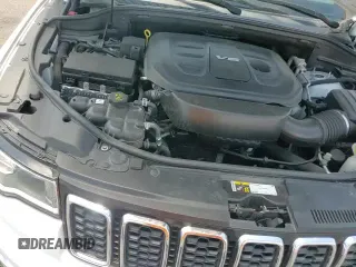 2019 Jeep Grand Cherokee Laredo E with VIN 1C4RJEAG0KC556467, listed as a Copart auction lot 65552475 with 69,520 mi miles and Salvage title. Bid and sale history available at DreamBid. Image 17.