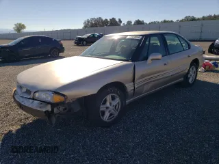 1999 Pontiac Bonneville SE z VIN 1G2HX52K4XH247855, wystawiony jako Copart lot #72559044 z przebiegiem 160 677 mil mil oraz Szkoda całkowita • Salvage title. Historia ofert i sprzedaży dostępna na DreamBid. Obrazek 1.