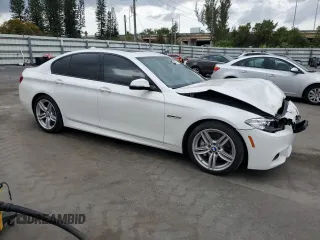 2014 BMW 5 Series 535d with VIN WBAXA5C58ED690402, listed as a Copart auction lot 48124575 with 153,702 mi miles and Salvage Title. Bid and sale history available at DreamBid. Image 4.