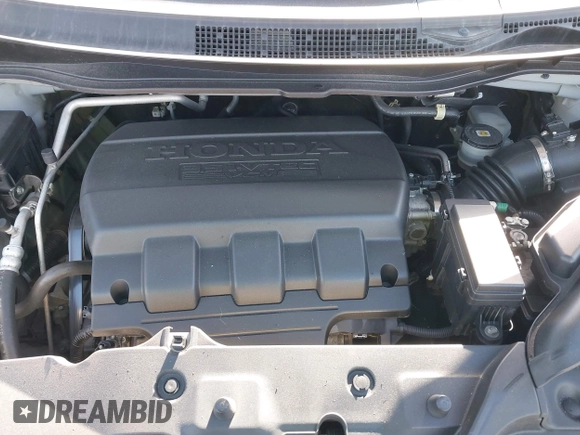 2011 Honda Odyssey Touring with VIN 5FNRL5H92BB049901, listed as a IAAI auction lot 41985224 with 101,957 mi miles and . Bid and sale history available at DreamBid. Image 10.