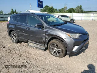 2016 Toyota RAV4 XLE with VIN JTMRFREV0GJ082234, listed as a Copart auction lot 64941855 with 193,270 mi miles and Salvage title. Bid and sale history available at DreamBid. Image 4.