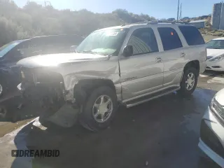 2005 GMC Yukon Denali z VIN 1GKEK63U35J228887, wystawiony jako Copart lot #68141304 z przebiegiem 238 024 mil mil oraz Szkoda całkowita • Salvage title. Historia ofert i sprzedaży dostępna na DreamBid. Obrazek 1.