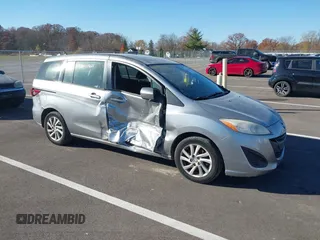 2012 Mazda 5 Sport z VIN JM1CW2BL0C0102448, wystawiony jako IAAI lot #38035360 z przebiegiem 119 438 mil mil oraz . Historia ofert i sprzedaży dostępna na DreamBid. Obrazek 1.