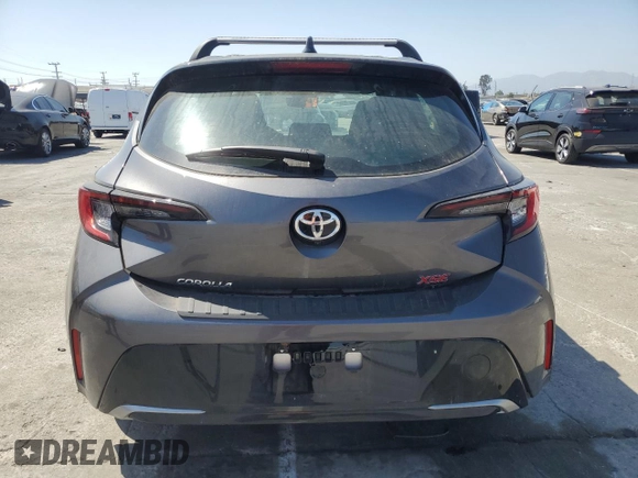 2023 Toyota Corolla Hatchback XSE with VIN JTNC4MBE4P3197390, listed as a Copart auction lot 60291254 with 4,556 mi miles and Salvage Title. Bid and sale history available at carsss.com. Image 6.