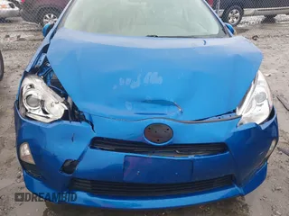 2014 Toyota Prius One z VIN JTDKDTB34E1571983, wystawiony jako IAAI lot #41760657 z przebiegiem 237 497 mil mil oraz . Historia ofert i sprzedaży dostępna na DreamBid. Obrazek 6.