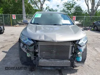 2019 Chevrolet Equinox LT z VIN 3GNAXKEVXKS586516, wystawiony jako IAAI lot #42323792 z przebiegiem 53 710 mil mil oraz . Historia ofert i sprzedaży dostępna na DreamBid. Obrazek 13.