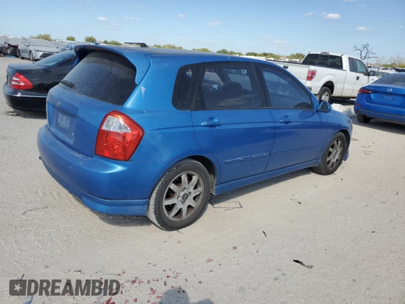 2005 Kia Spectra with VIN KNAFE161555082073, listed as a Copart auction lot 77062804 with 173,387 mi miles and Salvage Title. Bid and sale history available at DreamBid. Image 3.