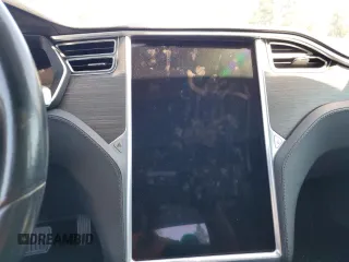 2014 Tesla Model S 60 with VIN 5YJSA1H12EFP51909, listed as a Copart auction lot 55489705 with Not Provided miles and Clean Title. Bid and sale history available at DreamBid. Image 9.
