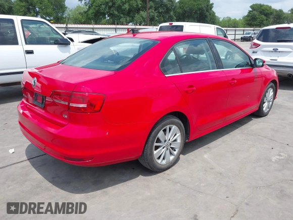2015 Volkswagen Jetta SE with VIN 3VWD07AJ3FM275737, listed as a IAAI auction lot 42098894 with 131,716 mi miles and . Bid and sale history available at DreamBid. Image 4.