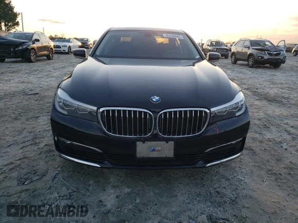 2017 BMW 7 Series 740i xDrive with VIN WBA7E4C55HGU99795, listed as a Copart auction lot 85545124 with 99,304 mi miles and Salvage Title. Bid and sale history available at carsss.com. Image 5.