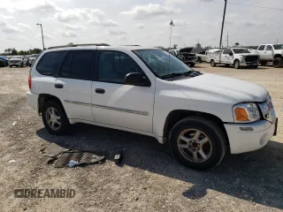 2008 GMC Envoy SLE1 with VIN 1GKDS13SX82220619, listed as a Copart auction lot 72654454 with 231,591 mi miles and Salvage Title. Bid and sale history available at DreamBid. Image 4.