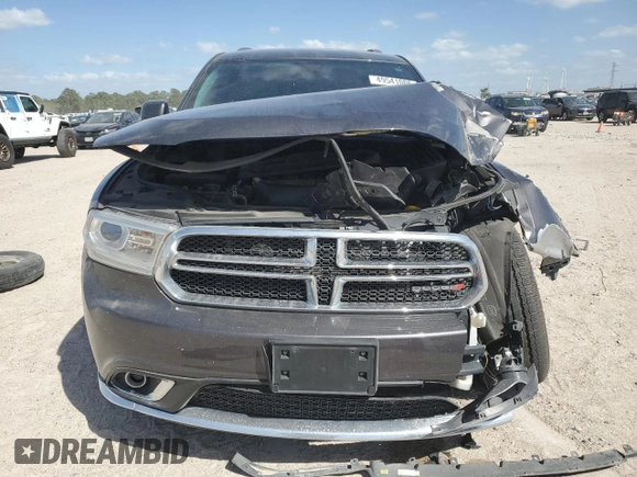 2018 Dodge Durango SXT with VIN 1C4RDJAG0JC329682, listed as a Copart auction lot 49541005 with 102,596 mi miles and Salvage Title. Bid and sale history available at DreamBid. Image 5.
