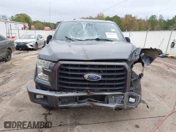 2015 Ford F-150 XLT with VIN 1FTEX1EP7FFA52955, listed as a IAAI auction lot 40799137 with 134,290 mi miles. Bid and sale history available at carsss.com. Image 13.