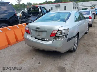 2007 Toyota Camry CE with VIN 4T1BE46K77U140703, listed as a IAAI auction lot 40193348 with 183,987 mi miles. Bid and sale history available at carsss.com. Image 4.