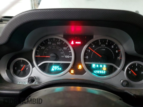 2009 Jeep Wrangler Sahara z VIN 1J4FA54189L789642, wystawiony jako Copart lot #89078145 z przebiegiem 128 902 mil mil oraz Szkoda całkowita • Salvage title. Historia ofert i sprzedaży dostępna na DreamBid. Obrazek 9.