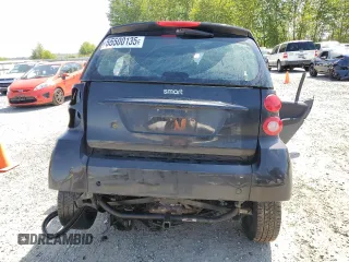 2009 Smart fortwo Pure z VIN WMEEJ31X09K267836, wystawiony jako Copart lot #55500135 z przebiegiem Nie podano mil oraz Szkody całkowita. Historia ofert i sprzedaży dostępna na DreamBid. Obrazek 6.