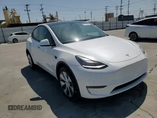 2022 Tesla Model Y Long Range z VIN 7SAYGDEE2NF513823, wystawiony jako Copart lot #51174795 z przebiegiem 28 143 mil mil oraz Szkody całkowita. Historia ofert i sprzedaży dostępna na DreamBid. Obrazek 11.